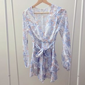 Brand new floral long sleeves romper